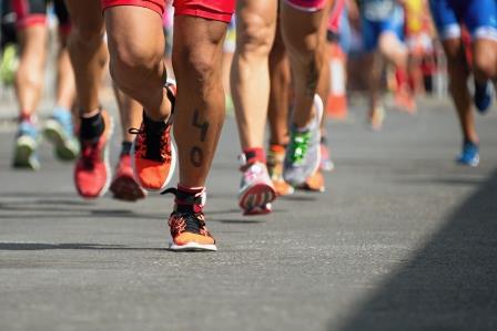 legs of many runners in a triathlon race